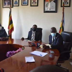 Members of the Commission_ Hon. Mulumba and Dr. Achan joint the Attorney General Hon. Kiryoowa Kiwanuka to jointly brief the media about the Tuesday meeting